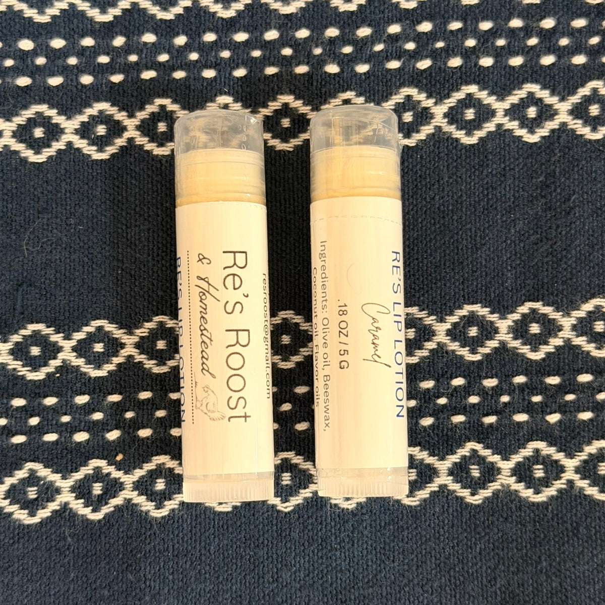 Lip lotions on blue cloth