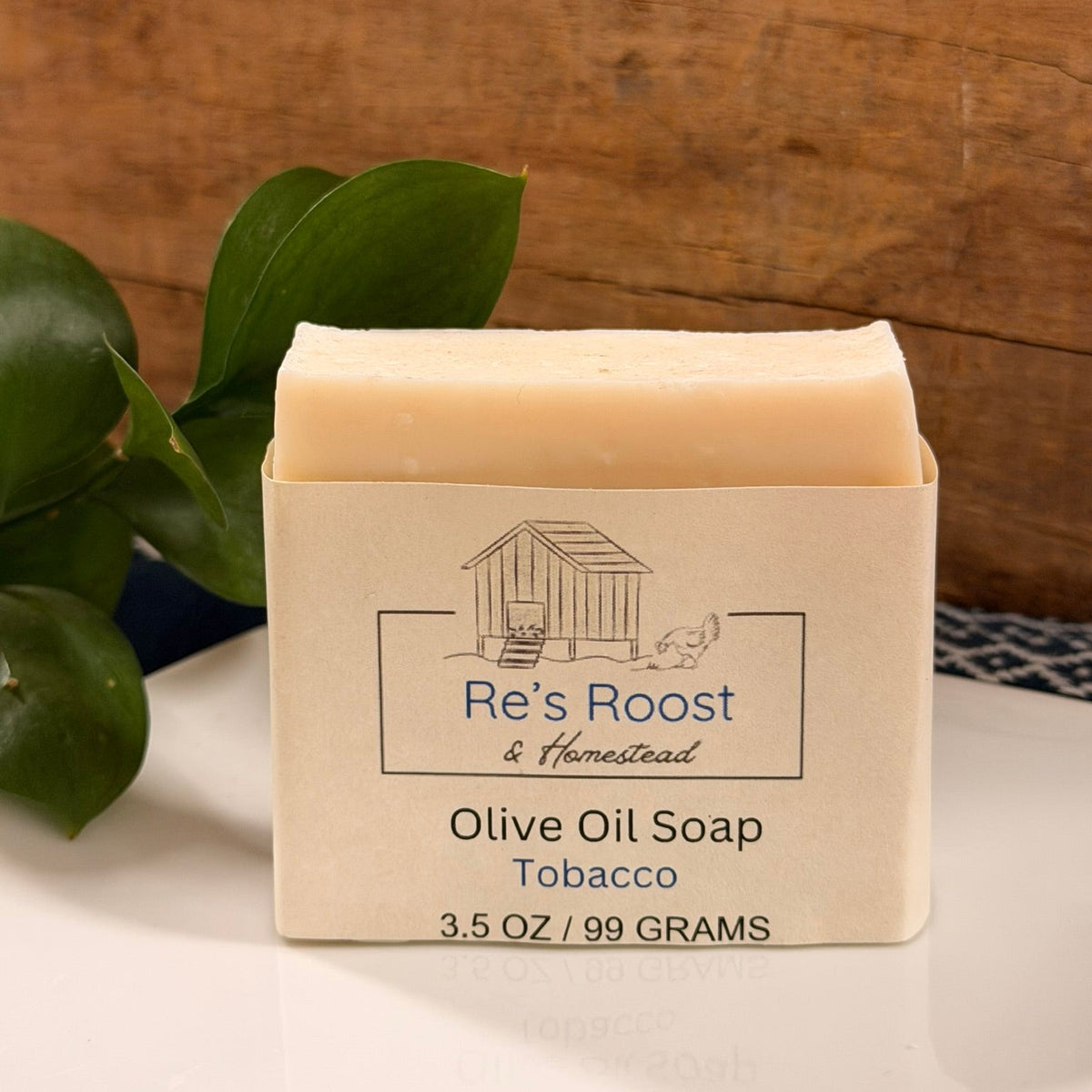 Tobacco scented soap on white dish